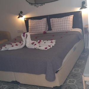 Kamer met een Queen Size Bed